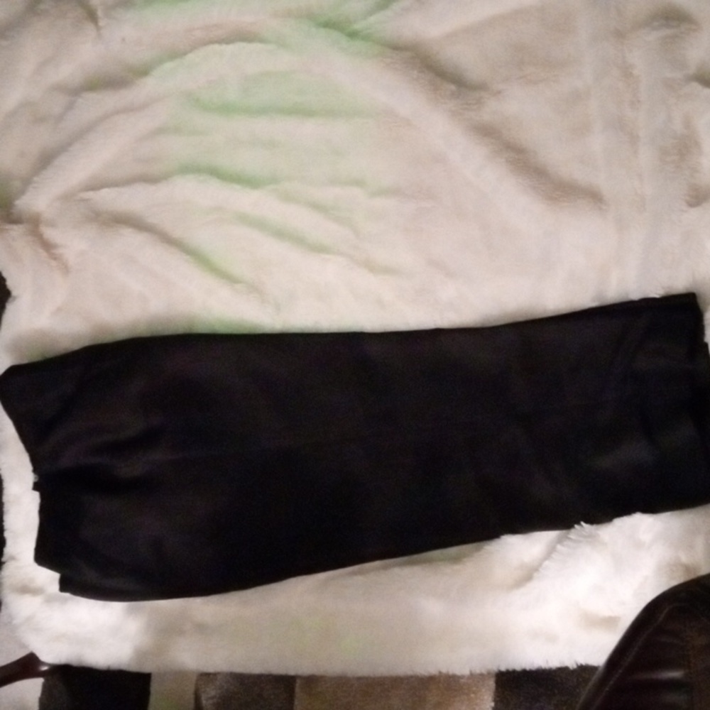Silk lined straight leg pants no pockets very good condition.  Sz.  Black